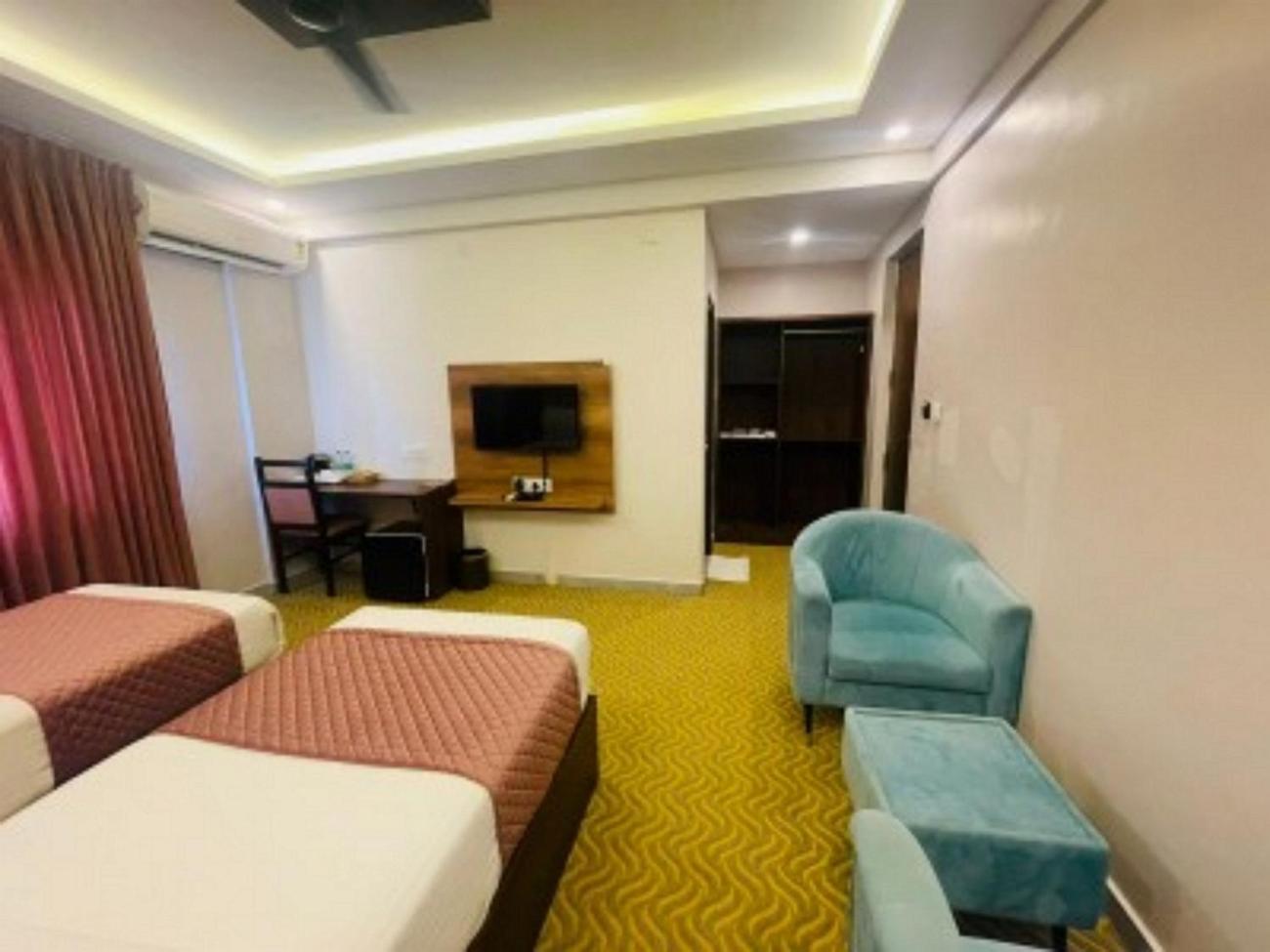 Vovo Hotels Yelahanka Bagian luar foto