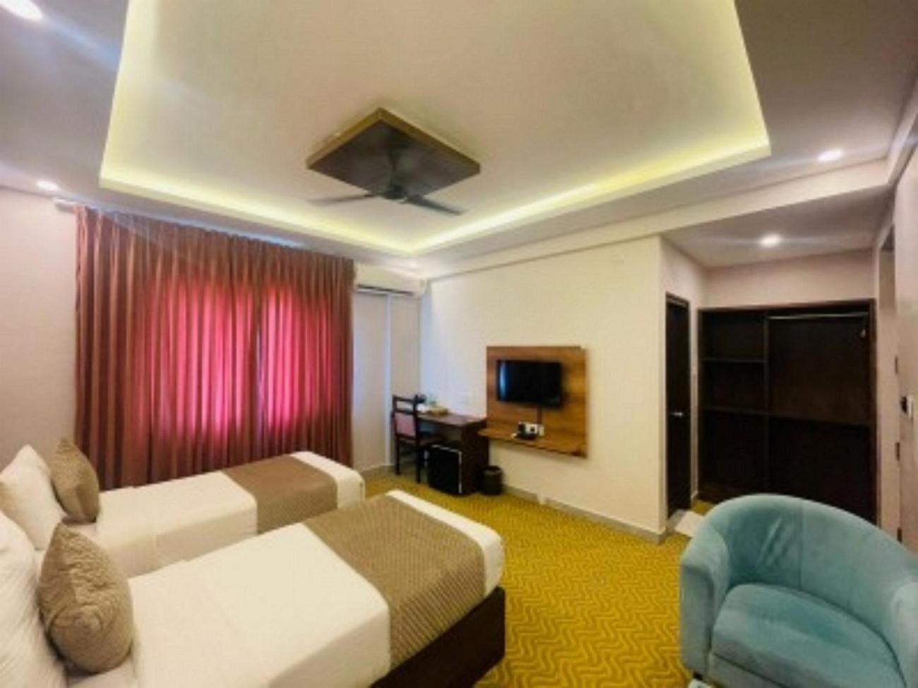Vovo Hotels Yelahanka Bagian luar foto