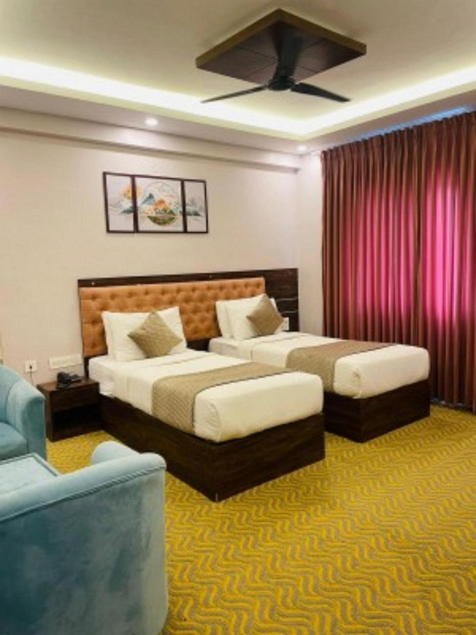 Vovo Hotels Yelahanka Bagian luar foto