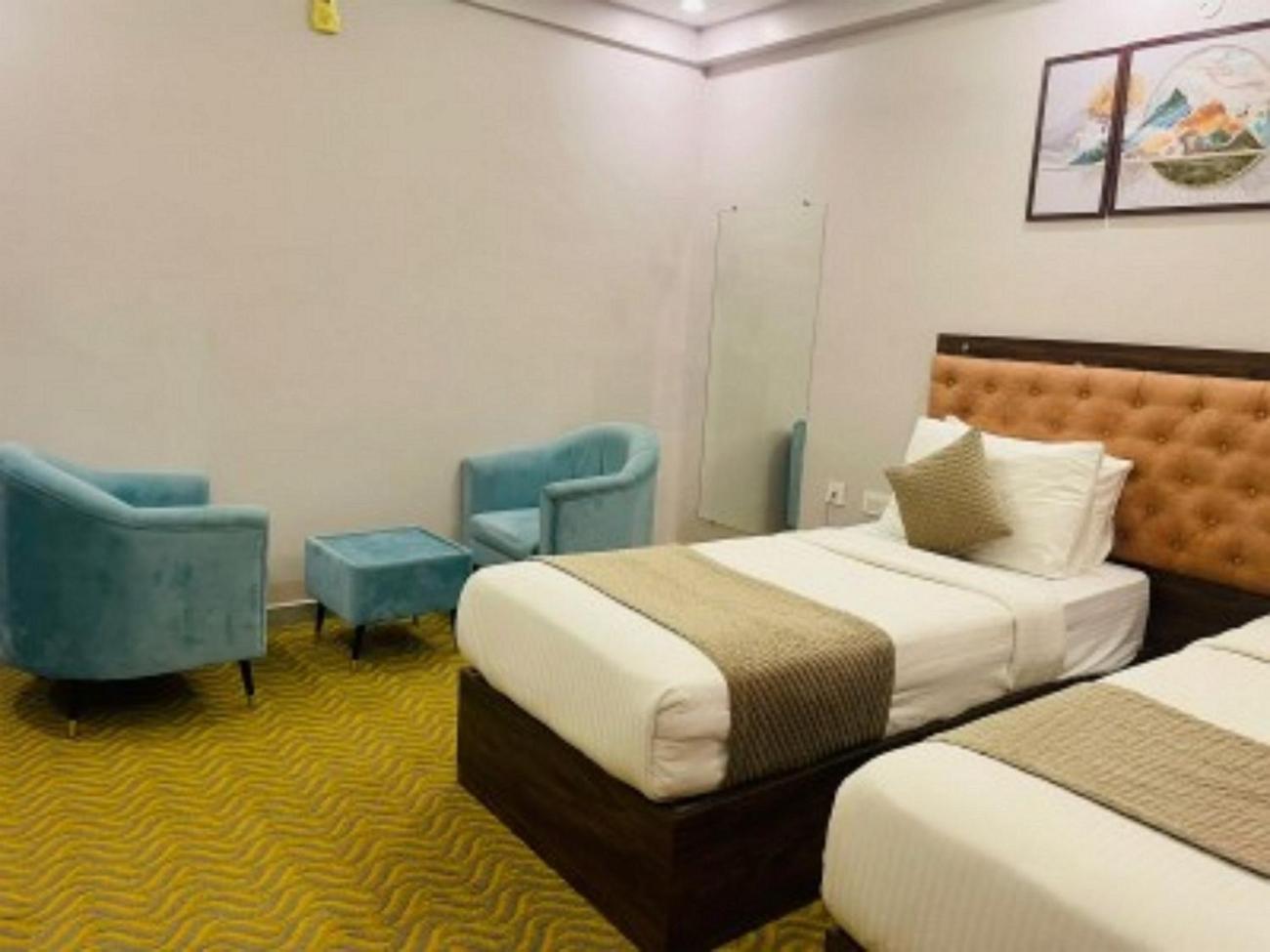 Vovo Hotels Yelahanka Bagian luar foto